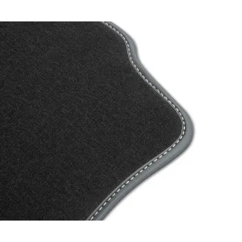 Dywaniki welurowe Premium do Nissan NV300 od 2016 - Czarna lamówka skórzana (błyszcząca) obszyta białą nicią
